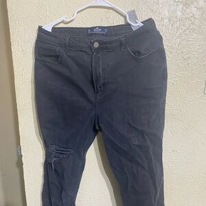 This is a ultra high-rise stacked vintage straight ripped black jeans